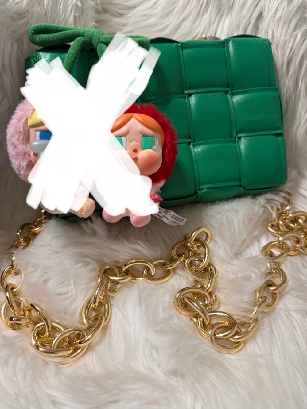 Green Woven Crossbody Bag 
 Gold Chain and POP MART cherry crybaby
NOT INCLUDED